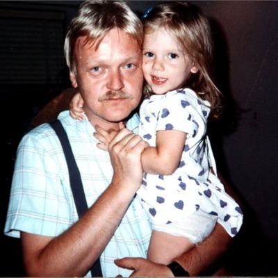Karsten Olaf Johansson carrying his daughter Scarlett Johansson.
